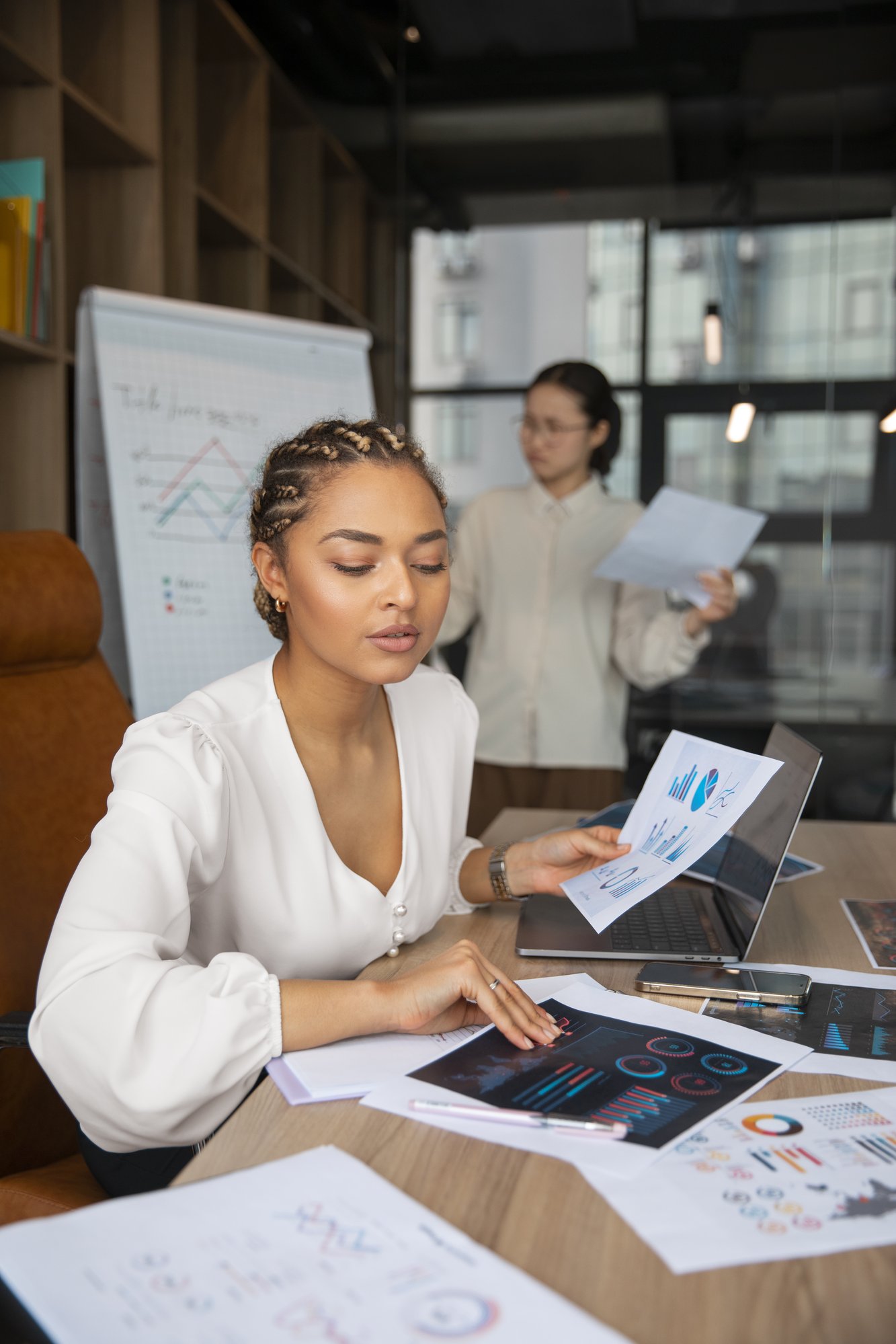 office-workers-using-finance-graphs
